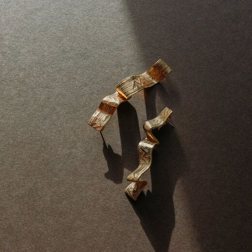 Long ribbon drop stud earrings by Emma Calvert